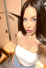Ukrainian mail order bride Yuliia from Kyiv with brunette hair and hazel eye color - image 11