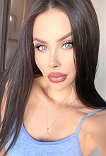 Ukrainian mail order bride Yuliia from Kyiv with brunette hair and hazel eye color - image 3