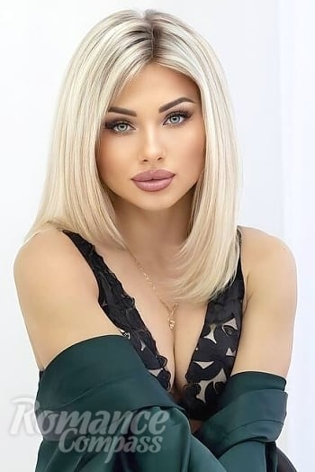 Ukrainian mail order bride Karina from Kyiv with blonde hair and green eye color - image 1