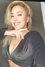 Ukrainian mail order bride Lina from Milan with blonde hair and brown eye color - image 4