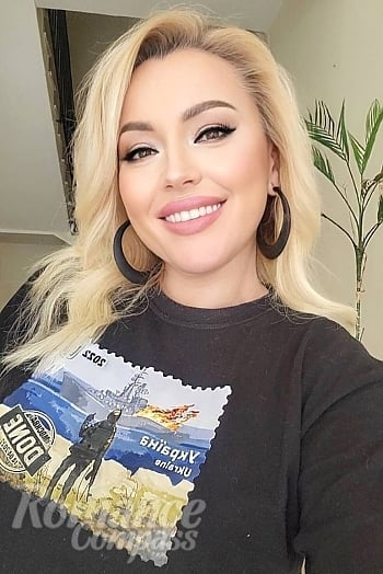 Ukrainian mail order bride Lina from Milan with blonde hair and brown eye color - image 1