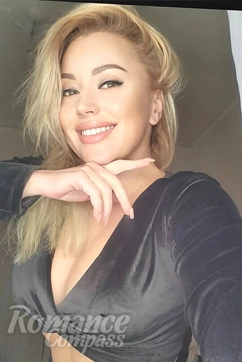Ukrainian mail order bride Lina from Milan with blonde hair and brown eye color - image 1