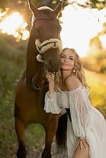 Ukrainian mail order bride Natalia from Warsaw with blonde hair and blue eye color - image 7