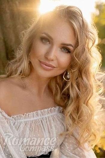 Ukrainian mail order bride Natalia from Warsaw with blonde hair and blue eye color - image 1