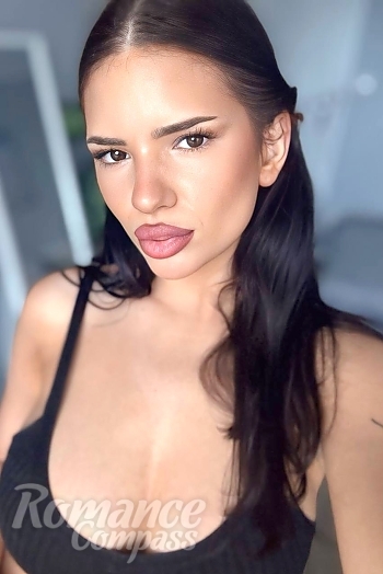 Ukrainian mail order bride Diana from Warsaw with black hair and black eye color - image 1