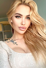 Ukrainian mail order bride Darya from Lviv with blonde hair and green eye color - image 9