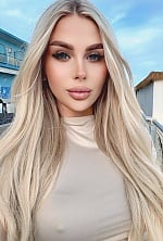 Ukrainian mail order bride Nelly from Ankara with blonde hair and green eye color - image 8