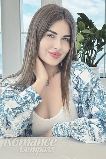 Ukrainian mail order bride Victoria from Odesa with light brown hair and blue eye color - image 1
