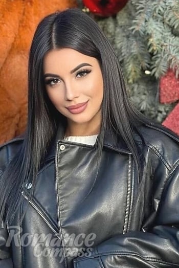 Ukrainian mail order bride Valeria from Kyiv with black hair and green eye color - image 1