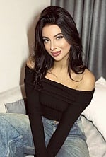Ukrainian mail order bride Valeria from Kyiv with black hair and green eye color - image 8