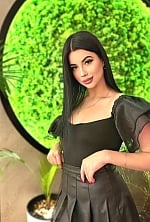 Ukrainian mail order bride Valeria from Kyiv with black hair and green eye color - image 11