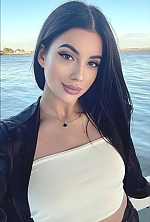 Ukrainian mail order bride Valeria from Kyiv with black hair and green eye color - image 11