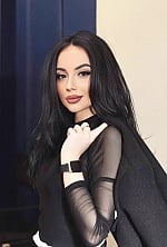 Ukrainian mail order bride Valeria from Kyiv with black hair and green eye color - image 10