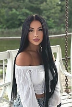 Ukrainian mail order bride Valeria from Kyiv with black hair and green eye color - image 6