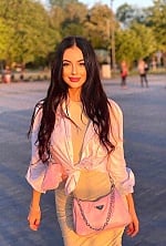 Ukrainian mail order bride Valeria from Kyiv with black hair and green eye color - image 3
