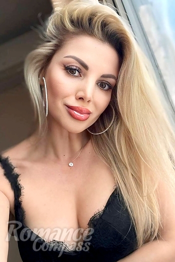 Ukrainian mail order bride Victoria from Sofia with blonde hair and brown eye color - image 1
