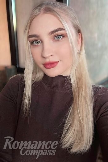 Ukrainian mail order bride Anastasiya from Kyiv with blonde hair and blue eye color - image 1