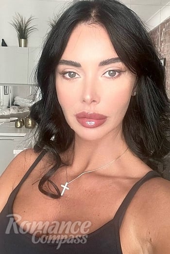 Ukrainian mail order bride Sveta from Kyiv with black hair and grey eye color - image 1
