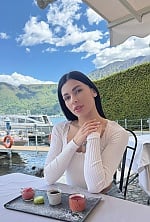 Ukrainian mail order bride Alexandra from Milan with black hair and green eye color - image 8