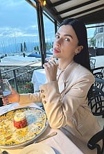 Ukrainian mail order bride Alexandra from Milan with black hair and green eye color - image 6
