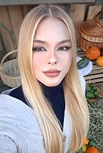Ukrainian mail order bride Roksolana from Ivano-Frankivsk with blonde hair and blue eye color - image 9
