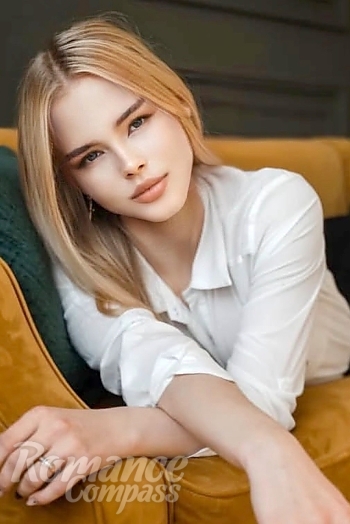 Ukrainian mail order bride Roksolana from Ivano-Frankivsk with blonde hair and blue eye color - image 1