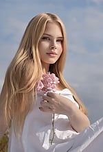 Ukrainian mail order bride Roksolana from Ivano-Frankivsk with blonde hair and blue eye color - image 3