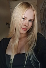 Ukrainian mail order bride Roksolana from Ivano-Frankivsk with blonde hair and blue eye color - image 9