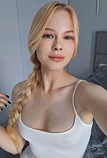 Ukrainian mail order bride Roksolana from Ivano-Frankivsk with blonde hair and blue eye color - image 11