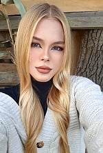 Ukrainian mail order bride Roksolana from Ivano-Frankivsk with blonde hair and blue eye color - image 10
