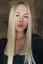 Ukrainian mail order bride Roksolana from Ivano-Frankivsk with blonde hair and blue eye color - image 8