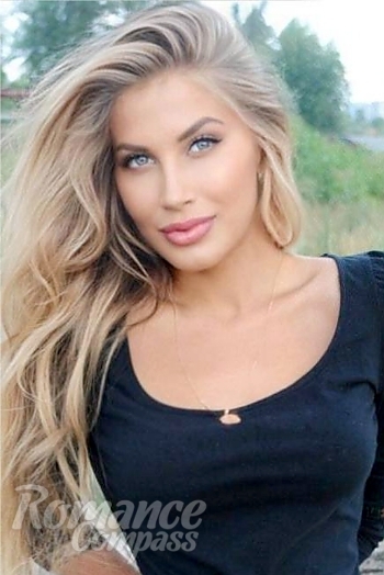 Ukrainian mail order bride Svetlana from Tallinn with blonde hair and blue eye color - image 1