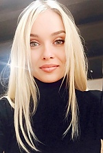 Ukrainian mail order bride Yulia from Kropyvnytskyi with blonde hair and blue eye color - image 9