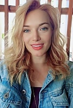 Ukrainian mail order bride Olena from Kyiv with light brown hair and blue eye color - image 14