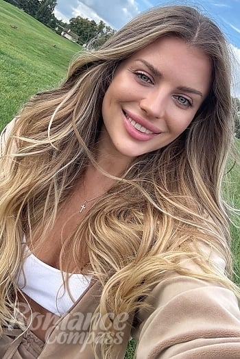 Ukrainian mail order bride Maryna from Kyiv with light brown hair and green eye color - image 1