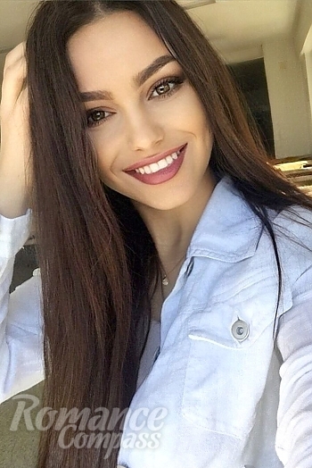 Ukrainian mail order bride Diana from Kyiv with light brown hair and brown eye color - image 1