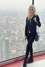 Ukrainian mail order bride Iryna from Lviv with blonde hair and grey eye color - image 4