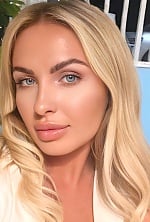 Ukrainian mail order bride Yaroslava from Paris with blonde hair and blue eye color - image 6