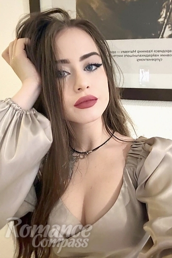 Ukrainian mail order bride Diana from Kyiv with light brown hair and blue eye color - image 1