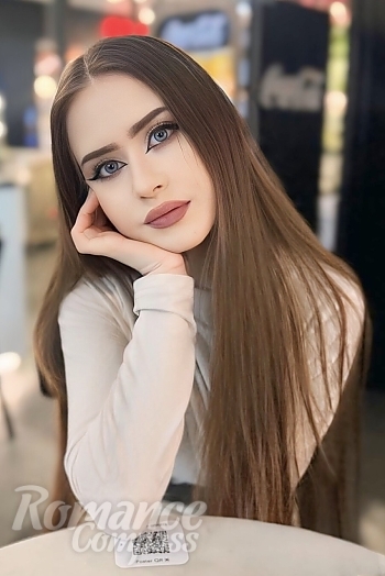 Ukrainian mail order bride Diana from Kyiv with light brown hair and blue eye color - image 1