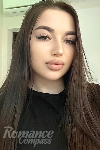 Ukrainian mail order bride Kateryna from Kyiv with light brown hair and green eye color - image 1