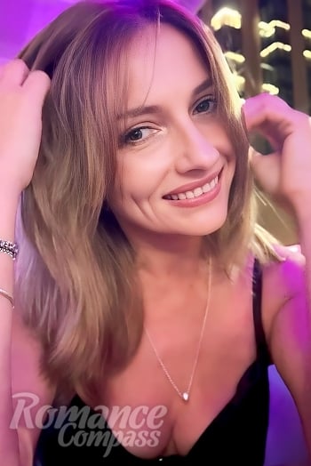 Ukrainian mail order bride Olga from Naarden with blonde hair and green eye color - image 1