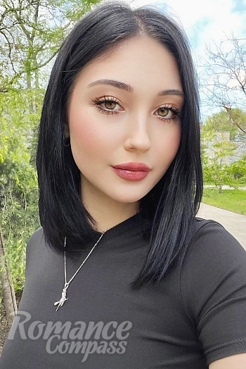 Ukrainian mail order bride Diana from Odesa with black hair and brown eye color - image 1