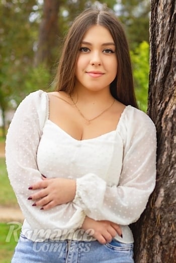 Ukrainian mail order bride Alona from Cherkasy with black hair and green eye color - image 1