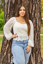 Ukrainian mail order bride Alona from Cherkasy with black hair and green eye color - image 4