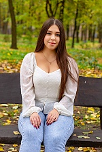 Ukrainian mail order bride Alona from Cherkasy with black hair and green eye color - image 2