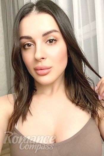 Ukrainian mail order bride Tetiana from Odesa with black hair and brown eye color - image 1