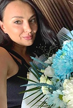 Ukrainian mail order bride Iryna from Kyiv with black hair and green eye color - image 4