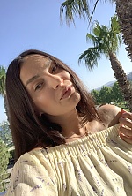 Ukrainian mail order bride Iryna from Kyiv with black hair and green eye color - image 5