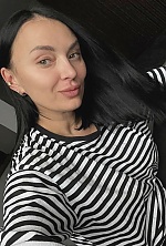 Ukrainian mail order bride Iryna from Kyiv with black hair and green eye color - image 9
